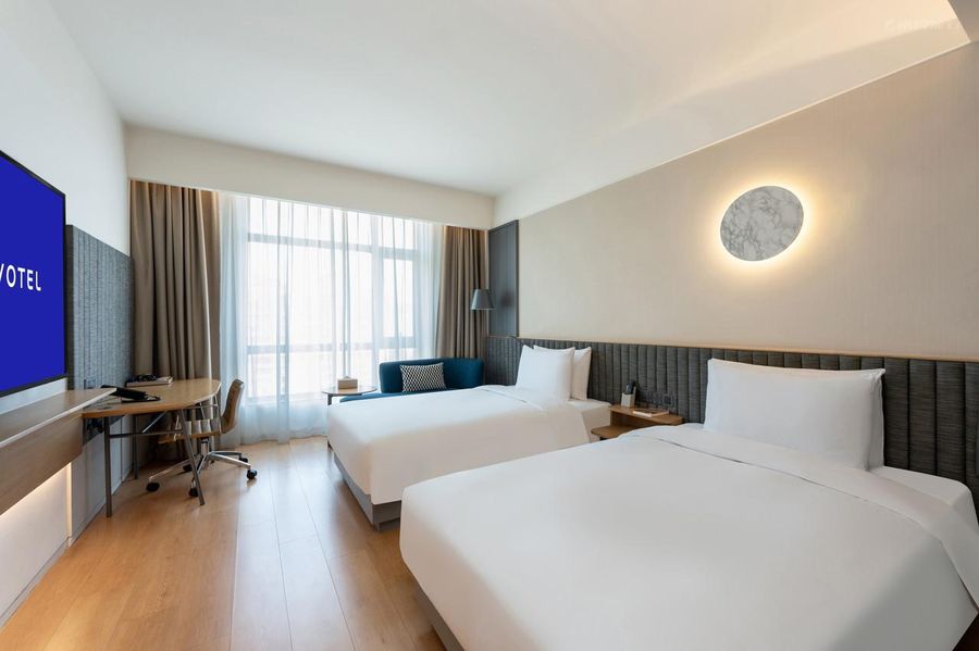 Guest room at Novotel Shanghai Gubei